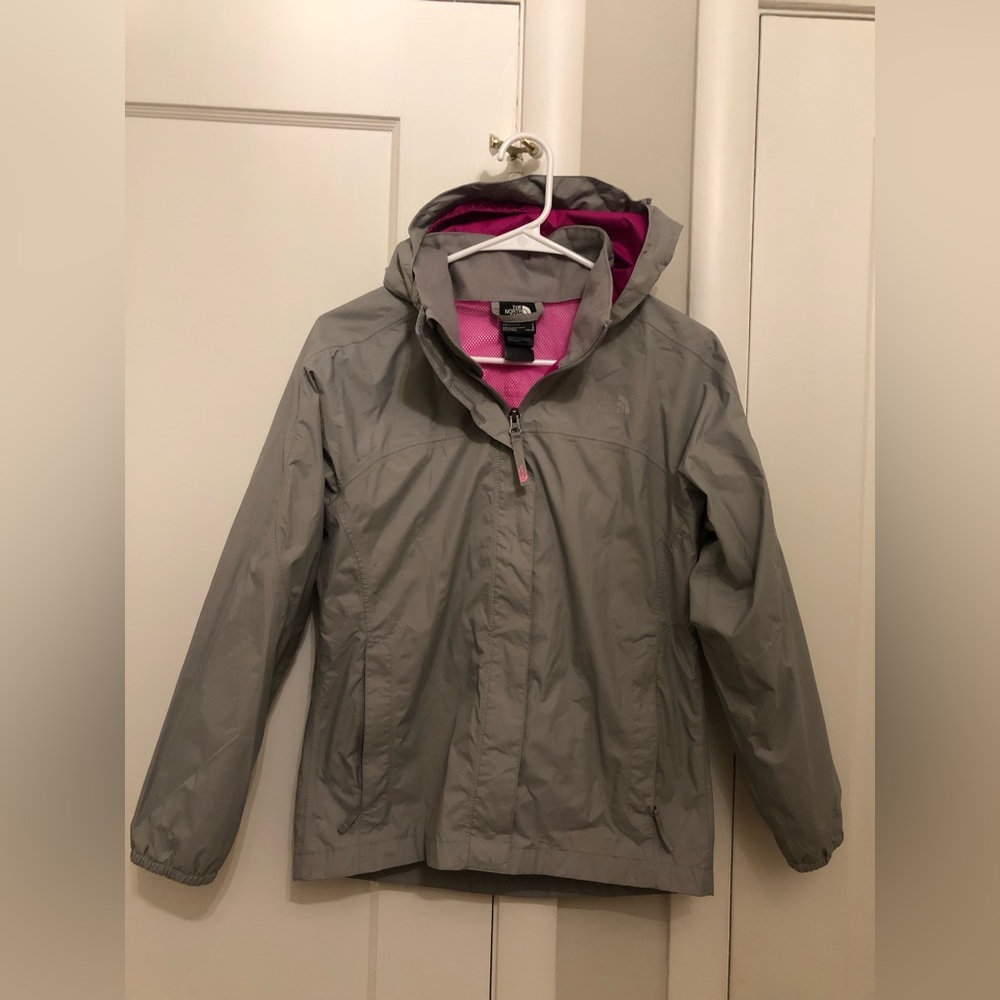 The North Face Raincoat Girls Size 14-16. Grey exterior, pink interior.